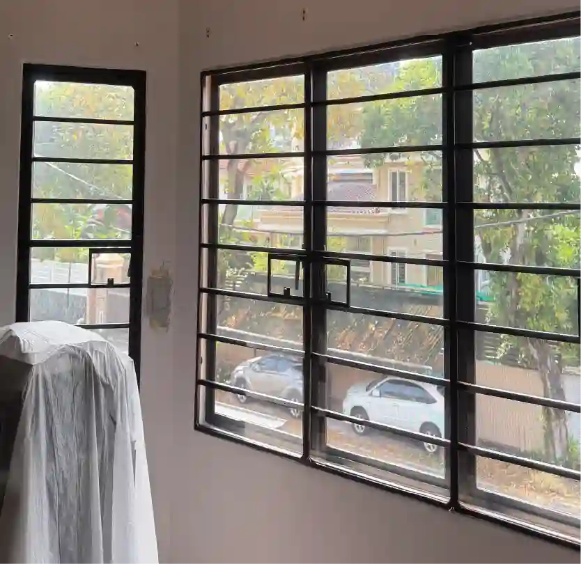 Ckool installer fitting window film on site